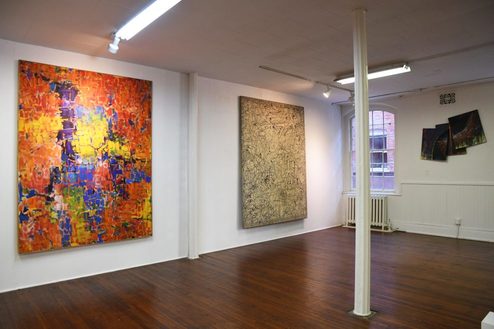 Paintings by Sy Boardman, Ernest Briggs, and Pérez Celis.